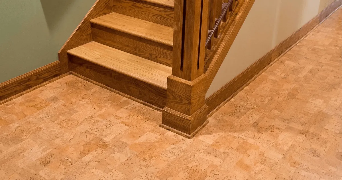 End of a staircase with cork flooring in Fort Collins, CO