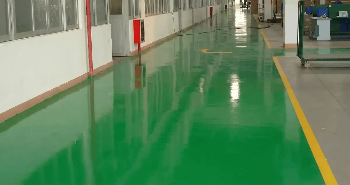 A factory floor professionally covered and marked with epoxy flooring in Fort Collins, CO