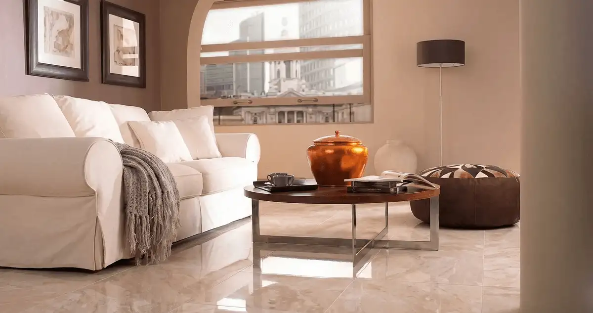 Modern living room with professionally installed marble flooring, a beige sofa, coffee table in Fort Collins, CO