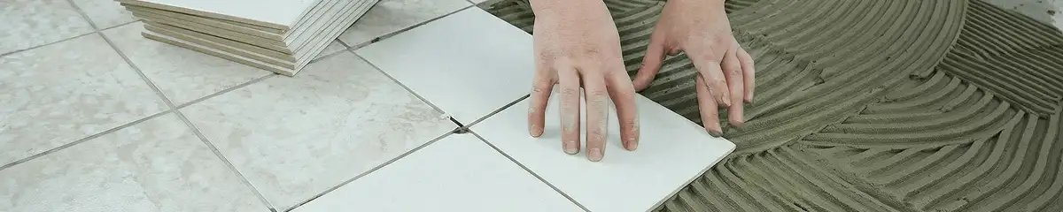 Professional installing white tile floors in Fort Collins, CO