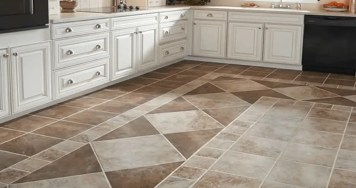Kitchen with white cabinets and a professionally installed tile floor in Fort Collins, CO